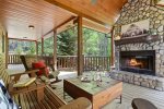 Outdoor wood burning fireplace on the main floor porch